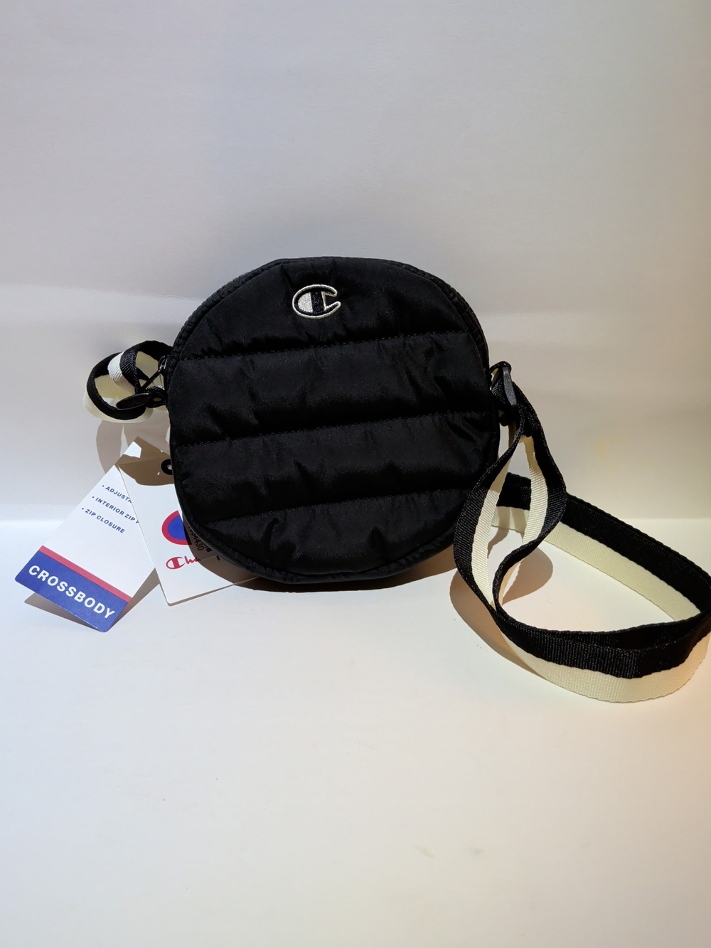 Champion Black Quilted Round Belt/Crossbody Bag with Ivory-Trim Strap